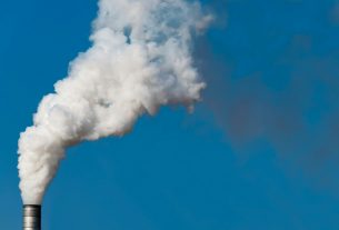 white smoke from factory chimney